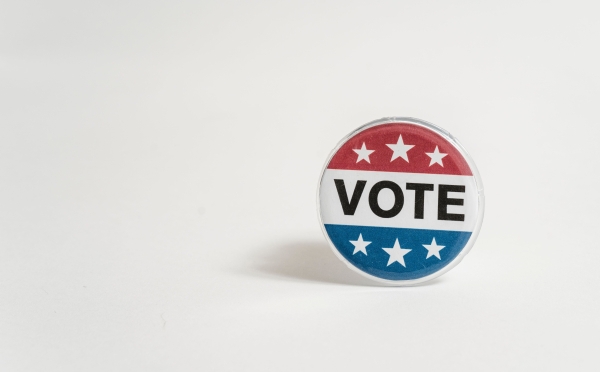 a button that reads "VOTE" on a blank white background
