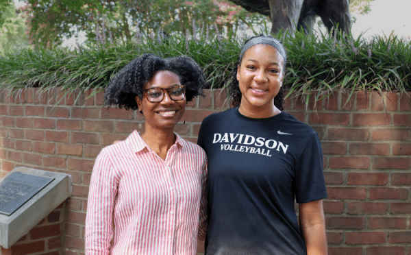 Whitney A. White ’08 and volleyball player Ariyana Johnson ’29