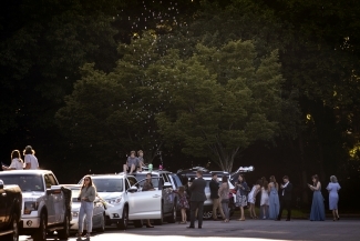 Guests lined up outside their cars 