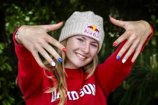 Davidson Olympian Evy Leibfarth with U.S. colors (red, white and blue) nail polish