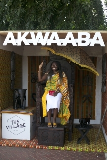 Student in Ghana Under a sign Akwaaba