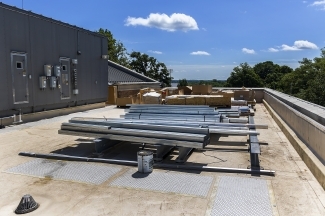 Roof of Wall Center with materials for Davidson greenhouse construction