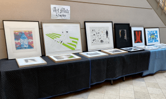 artwork laid out on table