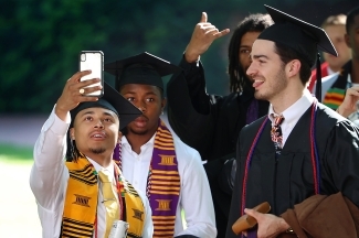 Group of students taking selfie at Commencement for Class of 2022