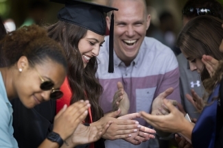 Group of people applauding at Class of 2022 Commencement