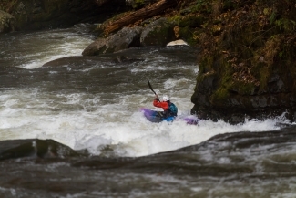 Ben Atherton '26 kayaks Green River Race