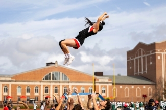 Cheerleader flying high