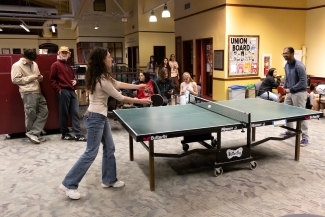 Students playing ping pong