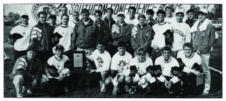 The 1992 men's soccer team poses for group photo
