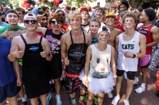 a group of young men in running outfits