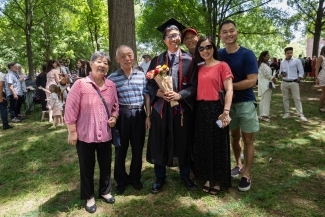 Commencement 2025 family with grad