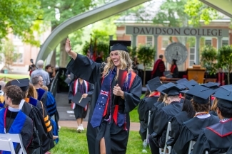Commencement 2025 grad waving