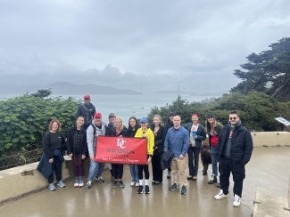 The San Francisco Chapter holding a Davidson flag