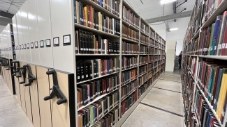Rows of books and movable shelves
