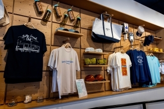 a wall of merch at a pickleball facility