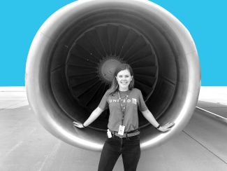 Elizabeth Sasser stands in an airline turbine
