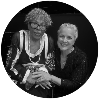 A round cropped image of Frederique Champagne Irwin ‘96 (right) with Dr. Opal Lee (left)