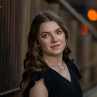 a headshot of Abigail Benko