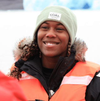 Samone Cullum ’25 headshot with a safety vest and hat on