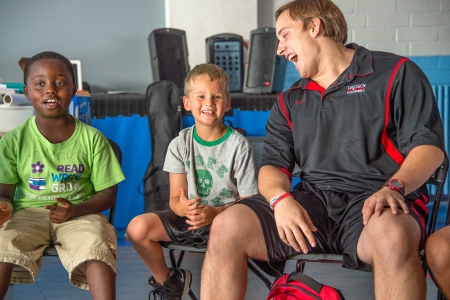 Davidson student sits with Freedom School students