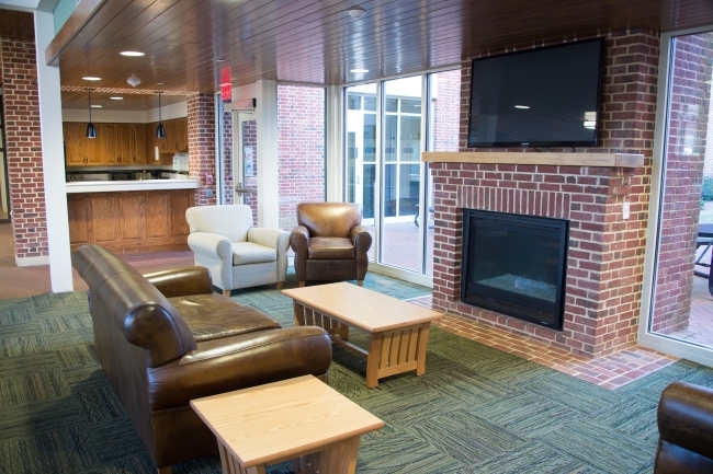 Chidsey First Floor Common Space with fireplace and couches