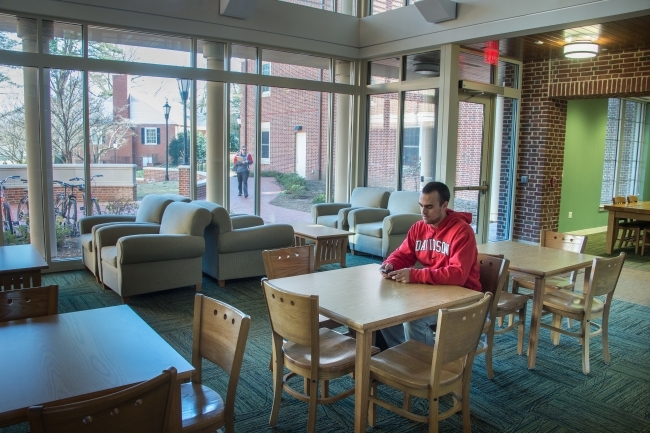 Chidsey Common Area with student sitting on shared table