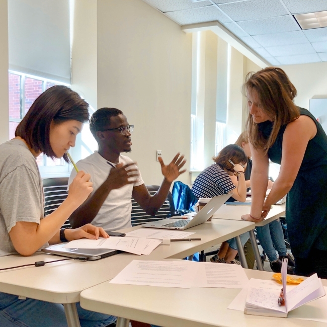 Two Students Talk to Professor