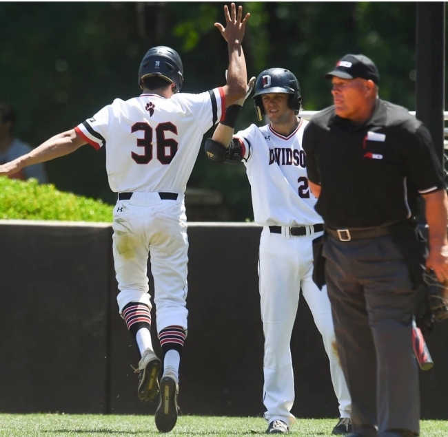 Matt Frey and Zach Nussbaum in baseball game 