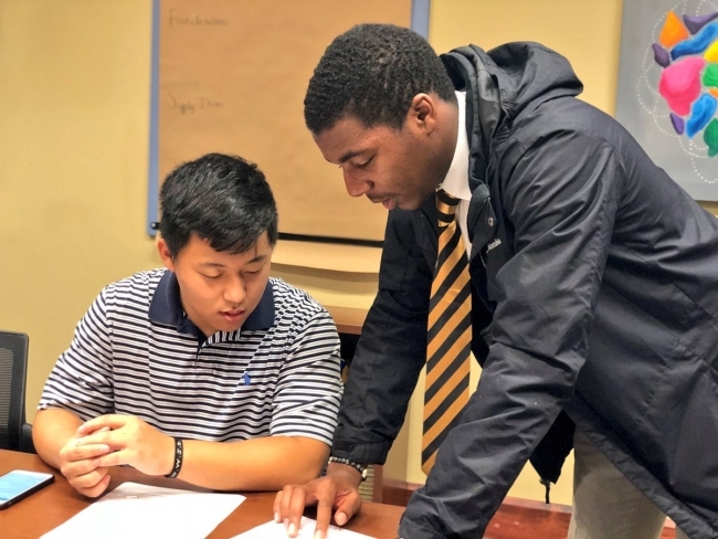 two people planning out Hurrican Florence relief efforts