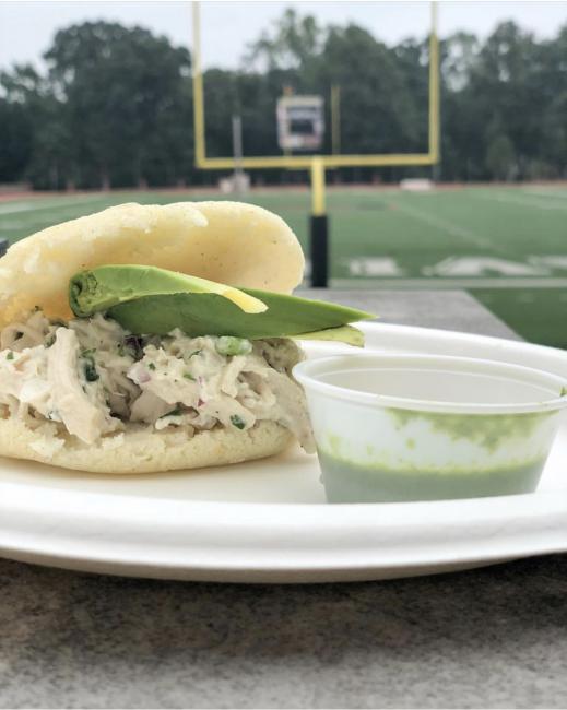 Chicken Arepa Special from Davis Café in front of football field