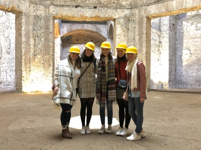 Students wearing hard hats inside Domus Aurea, a palace built by the Emperor Nero in the heart of ancient Rome