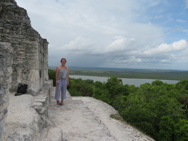 Student by ruins in Yaxha, Guatemala 