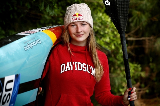 Davidson Olympian Evy Leibfarth '25 headshot with kayak and paddle