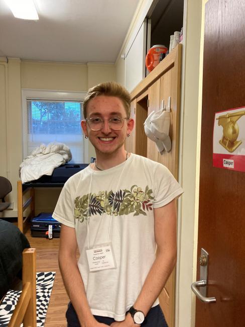 Davidson College first year student Cooper Ray Oljeski ’25 in his dorm room during orientation