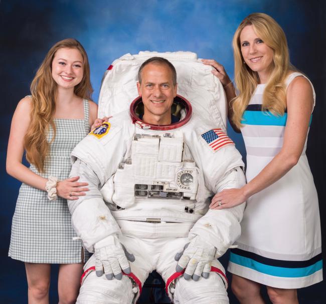 Marshburn Family Surrounds Tom Marshburn wearing his space suit