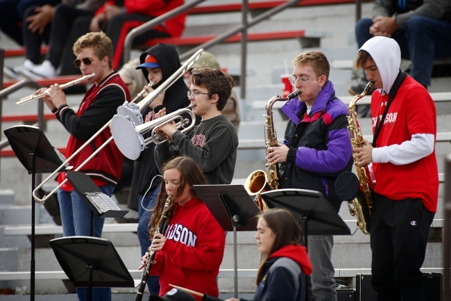 Davidson Pep Band Playing Instruments from Stands