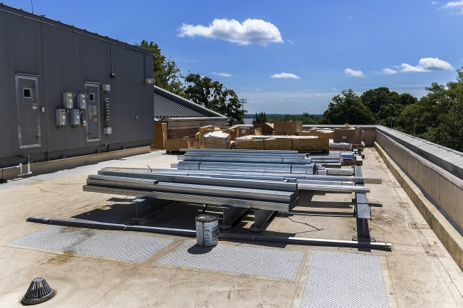Roof of Wall Center with materials for Davidson greenhouse construction