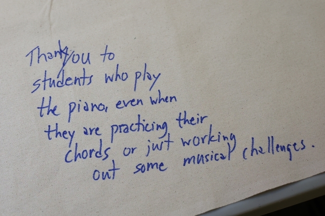 A thank you note that reads "Thank you to students who play the piano even when they are practicing their chords or just working out some musical challenges."