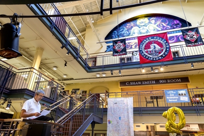 decorations, including college flags and balloons, for the celebration 