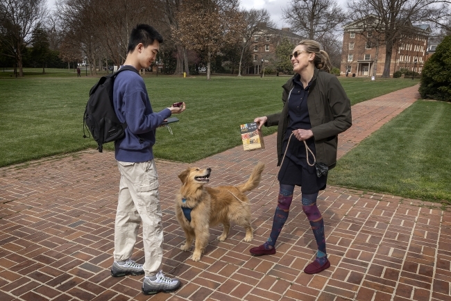 Theo and Kaye-Lani Pass Out Kind Bars to Students