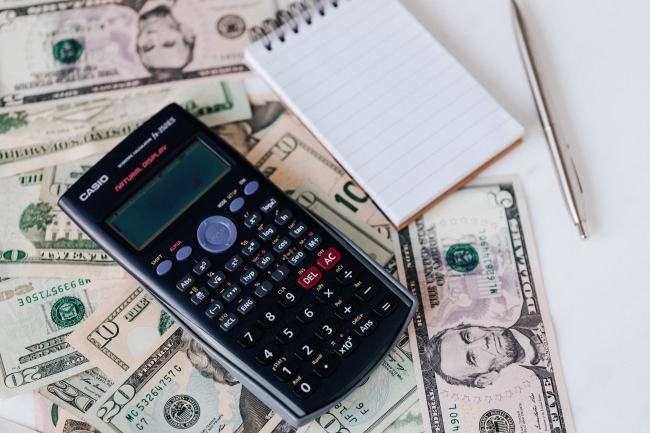 image of calculator and money