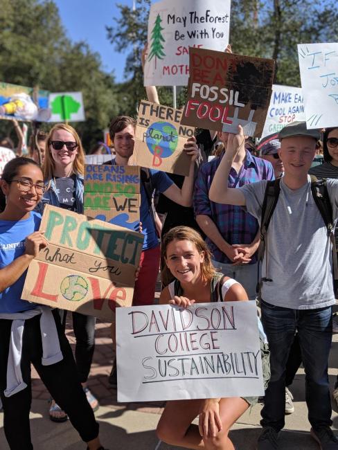 Students holding signs at climate strike