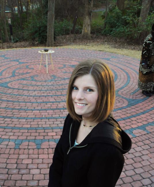 Lauren Cunningham in front of labyrinth