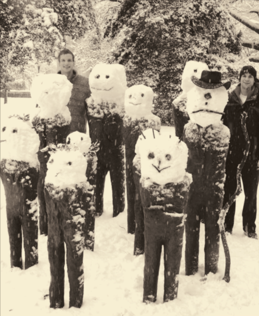 Students and snowmen on campus