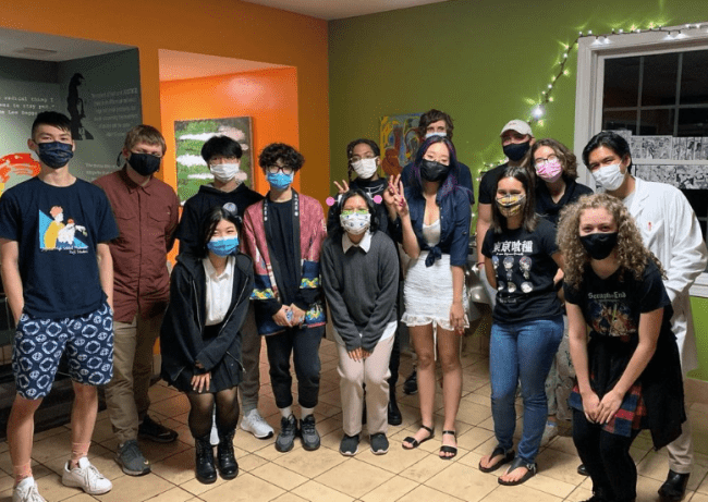 group of students meet as anime club