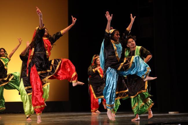 students performing bhangra folk dance