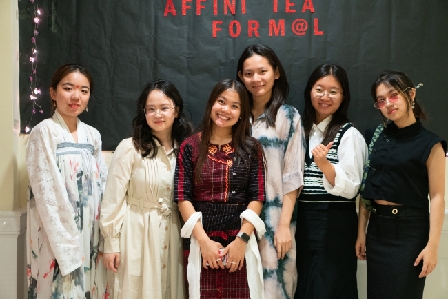 students dressed up and smiling