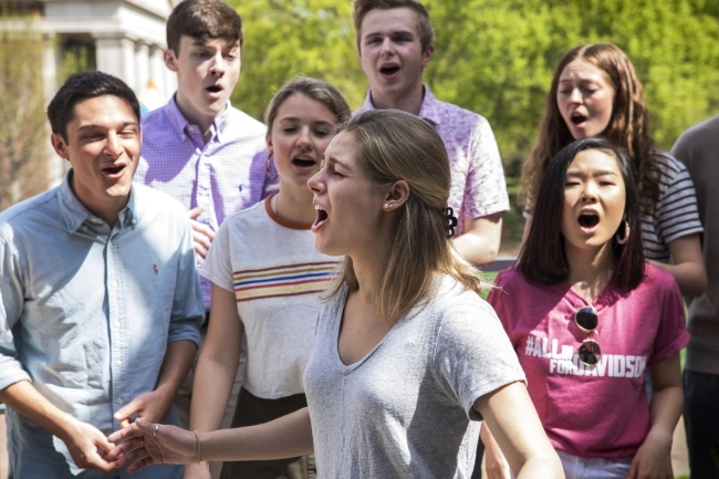 Students singing outdoors