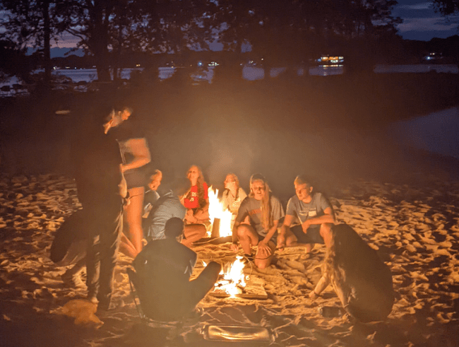 Students around campfire