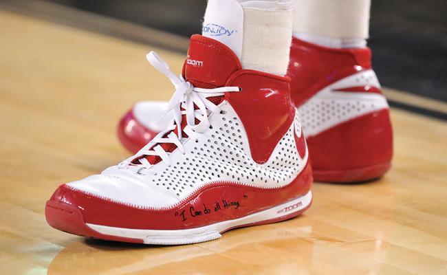 Stephen Curry's shoes from the 2008 Elite Eight run inscribed "I can do all things"